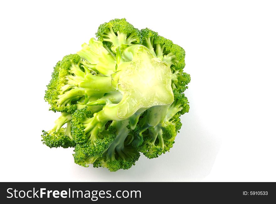 A photograph of broccoli upside down against a white background