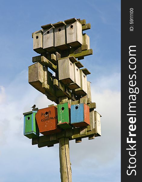 Nestling boxes against blue sky