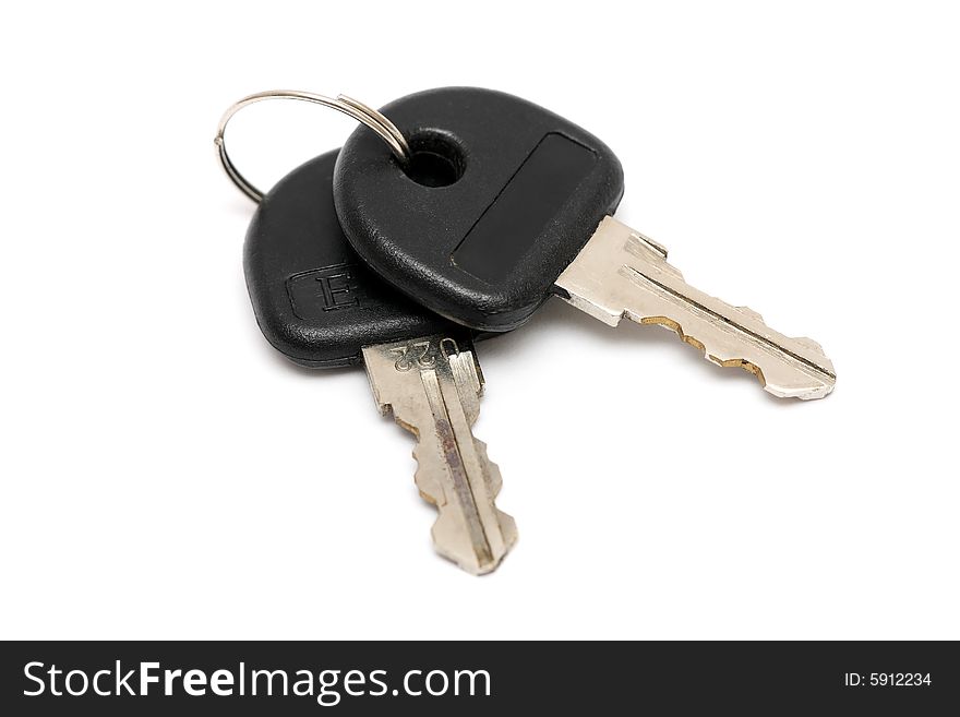 Two keys with black head isolated on white background.