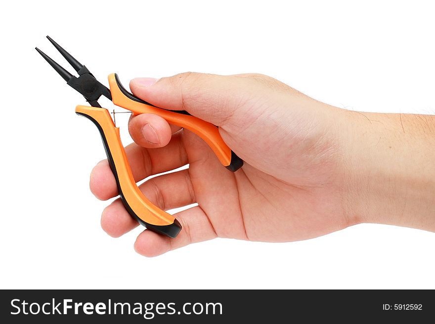 Man's hand holding a craft/jewelry plier over white background. Man's hand holding a craft/jewelry plier over white background.