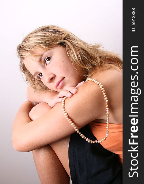 Young Model Holding Pearls