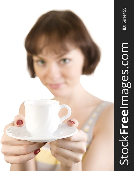 A photo of beautiful woman offering a cup of coffee. A photo of beautiful woman offering a cup of coffee