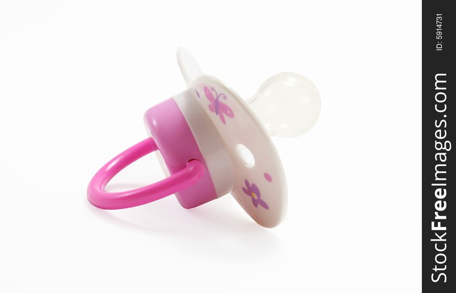 Pink pacifier isolated on white