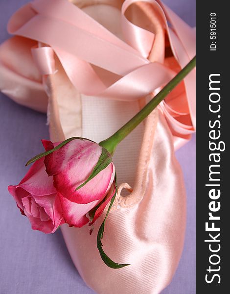 Satin Ballet shoe with a pink rose