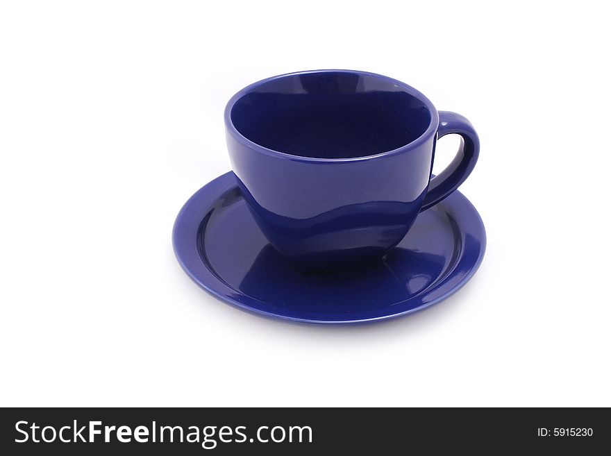Navy cup and saucer on white background