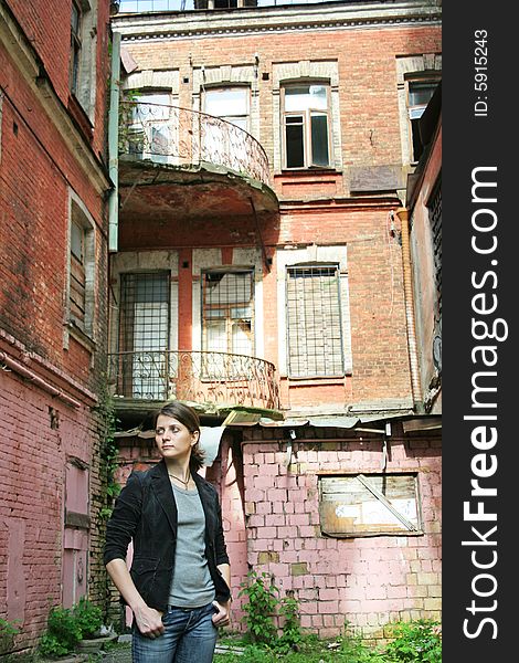Woman on the old architecture background