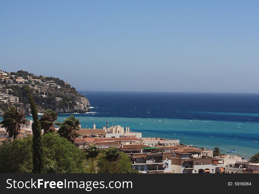 The beautiful bay of La Herradura on the Costa Tropical of southern Spain looking at La Punta de la Mona and out to sea. The beautiful bay of La Herradura on the Costa Tropical of southern Spain looking at La Punta de la Mona and out to sea.