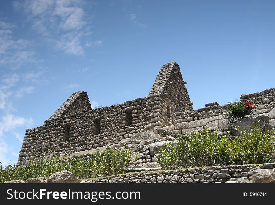 Ruins and terraces in lost city of Incas, Machu Picchu, Peru.