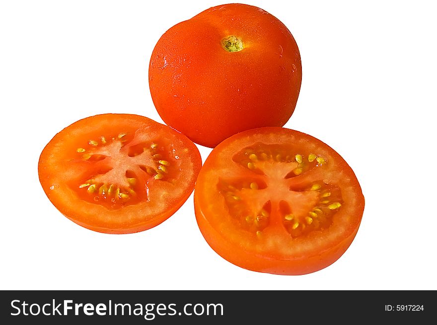 A tomato and two halves isolted on a white background  with clipping path. A tomato and two halves isolted on a white background  with clipping path