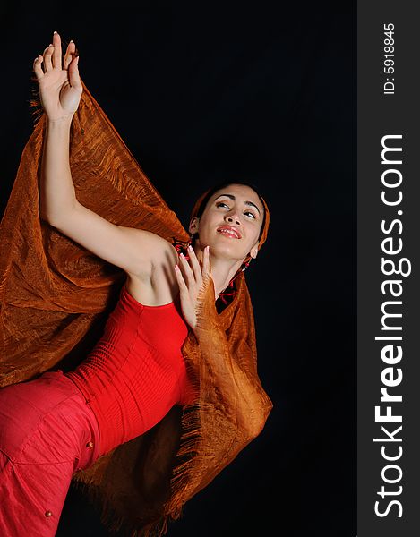 Portrait of young hispanic woman dancing in red clothes. Portrait of young hispanic woman dancing in red clothes