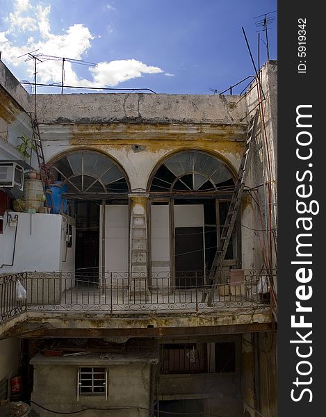 Detail of typical cuban building with shabby interior. Detail of typical cuban building with shabby interior