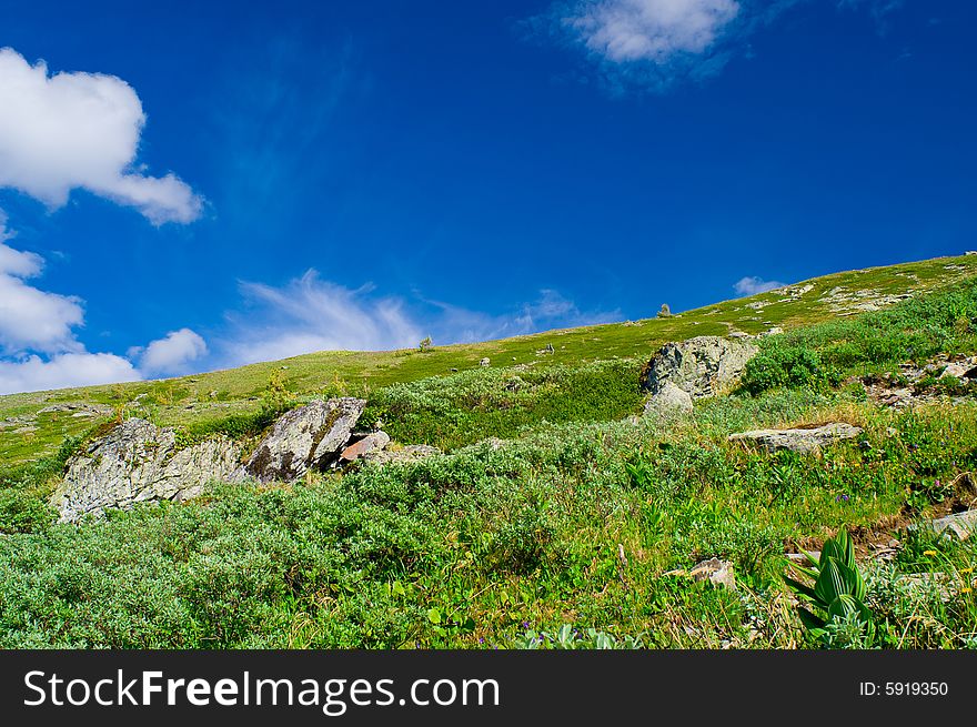 Altay landscape with blue sky and clouds. Altay landscape with blue sky and clouds