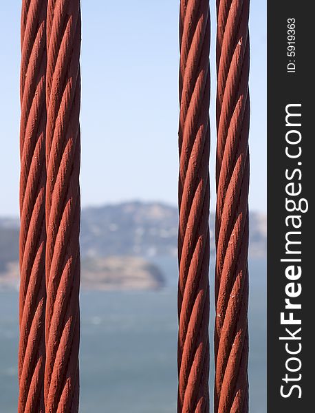 A close up macro shot of a suspension cable on the Golden Gate Bridge. A close up macro shot of a suspension cable on the Golden Gate Bridge.