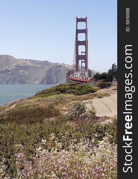 A shot of the Golden Gate Bridge taken from the path to Baker Beach.