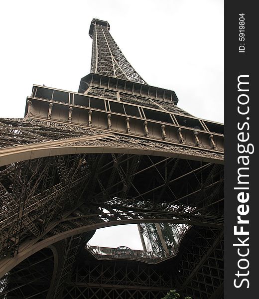Angel of the eiffel tower, an iron tower built on the Champ de Mars beside the Seine River in Paris. The tower has become a global icon of France and is one of the most recognizable structures in the world.