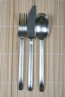 Fork Knife And Spoon On Bamboo Stock Images Fork Knife And Spoon On Bamboo Stock Images