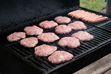 Grilling Hamburgers And Hotdogs Royalty Free Stock Images Grilling Hamburgers And Hotdogs Royalty Free Stock Images