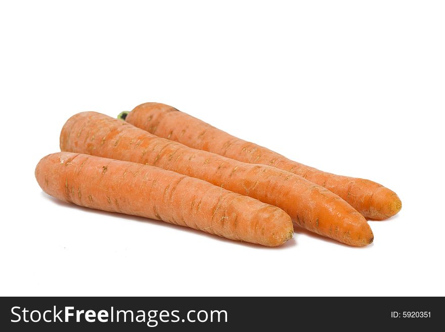 Three Carrots over the white. Three Carrots over the white