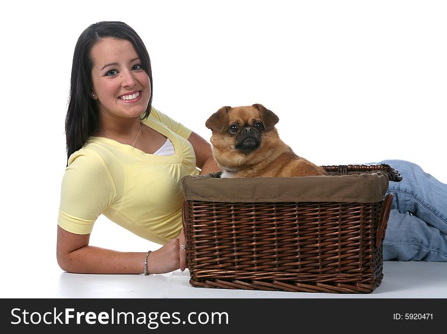 Cute teenage girl with small dog in basket. Cute teenage girl with small dog in basket