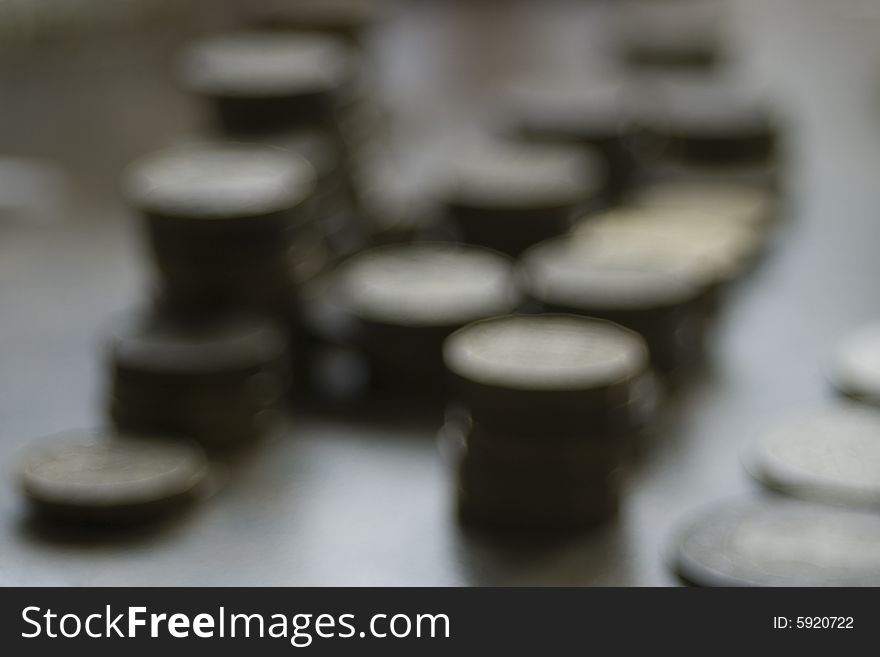 Blurred stacks of coins, suitable as a background