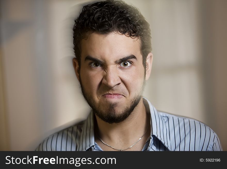Close Up of Angry Young Man with a Photographic Motion Effect. Close Up of Angry Young Man with a Photographic Motion Effect