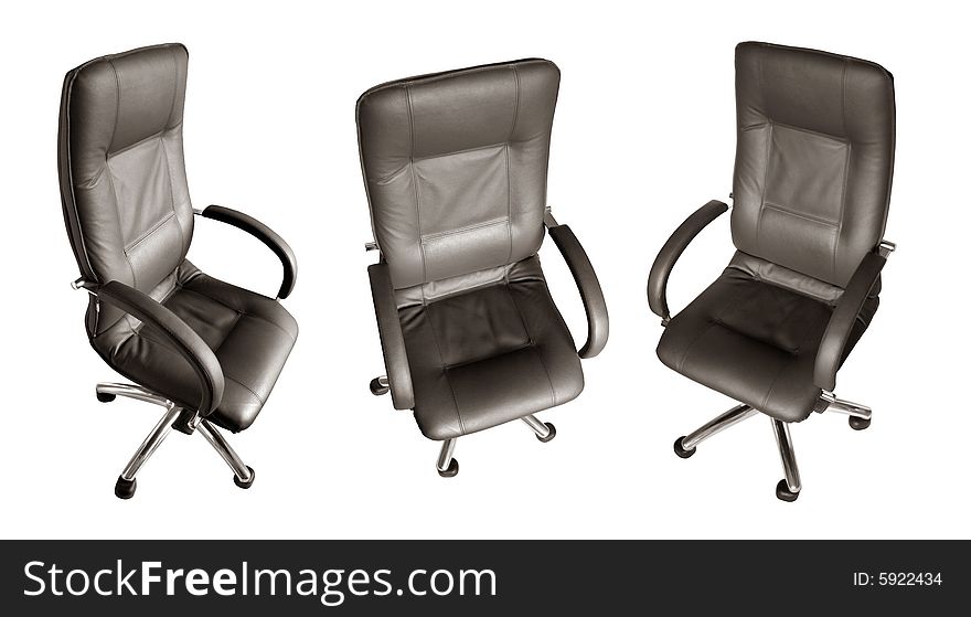 Some black leather armchairs in different foreshortenings are isolated