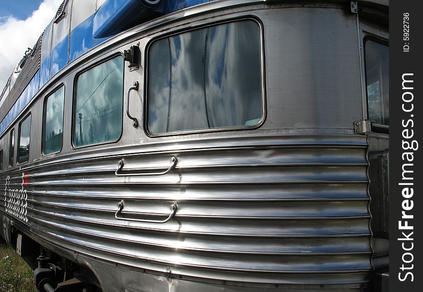 Silver passenger train on a railway