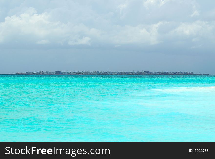 Island of Paradise. White sand beaches with coco-tree and crystal blue water. Maldives. Luxury holidays. Island of Paradise. White sand beaches with coco-tree and crystal blue water. Maldives. Luxury holidays.