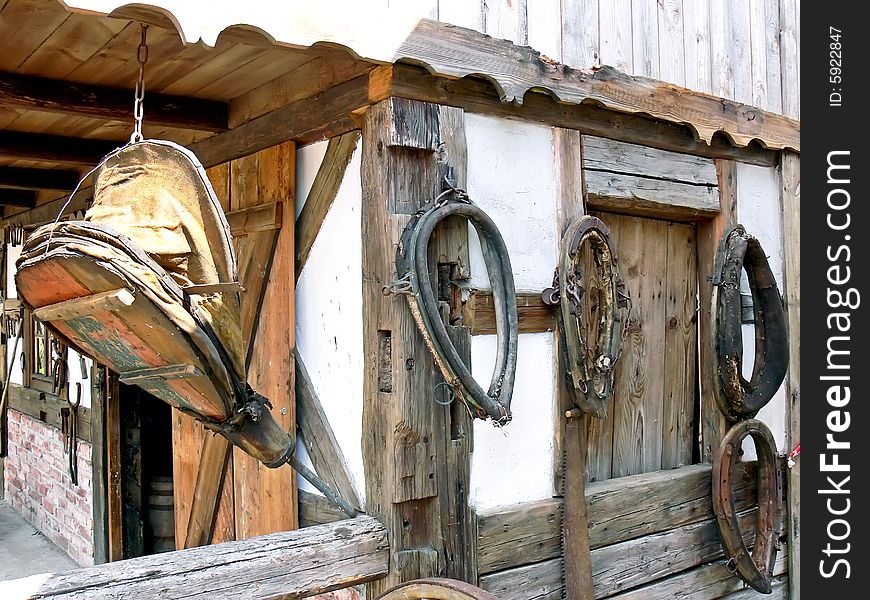 A view at the blacksmith workshop, tools and horse item. A view at the blacksmith workshop, tools and horse item.