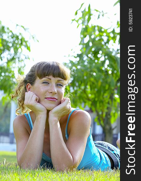 Portrait of young beautiful woman  in summer environment. Portrait of young beautiful woman  in summer environment