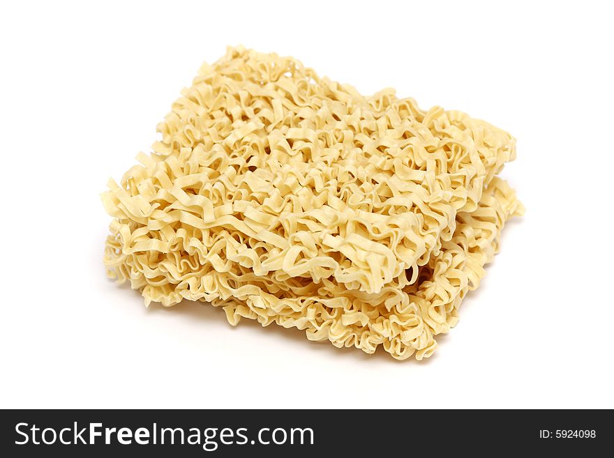 A stack of broad noodle isolated on white background.