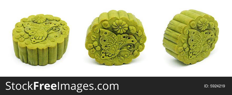 Three different angle view of a greentea flavor mooncake over white background. Three different angle view of a greentea flavor mooncake over white background.