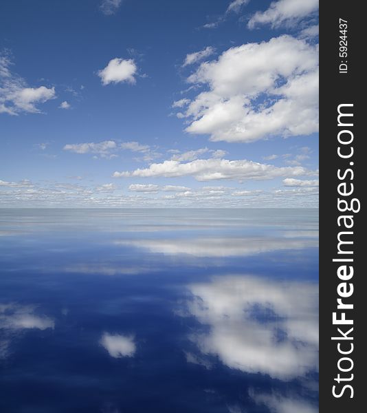 Clouds reflected in dark water. Clouds reflected in dark water