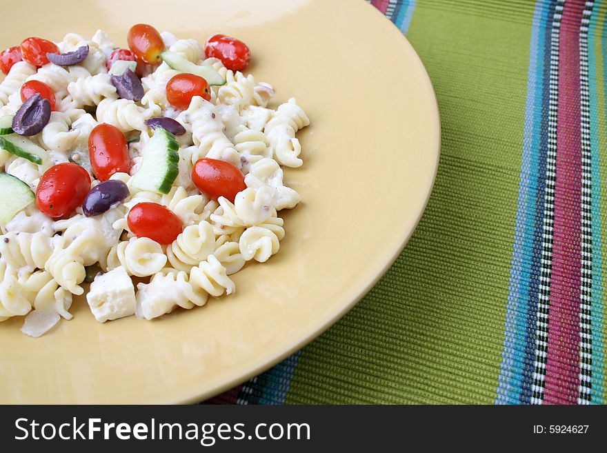 Cold Pasta Salad with tomatoes, cucumbers and olives