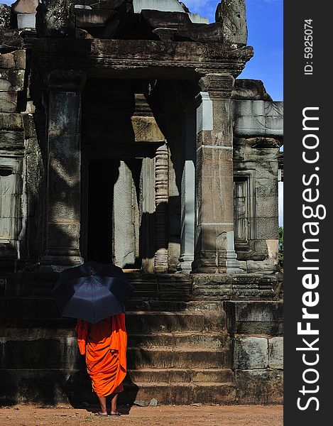 Cambodia Angkor wat with a monk