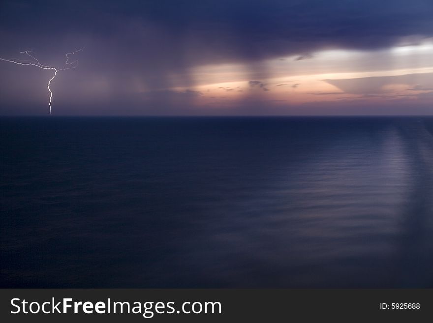 Lightning bolt seen during a thunderstorm at sea, taken from a cruise ship