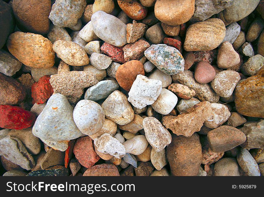 Colorful river stone solid background. Colorful river stone solid background