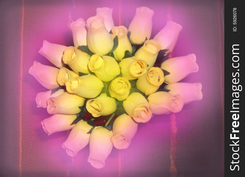 A bunch of yellow roses under a pink fog. Coloured picture. A bunch of yellow roses under a pink fog. Coloured picture.