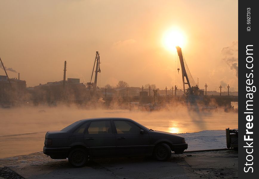 A car in a port in the evening