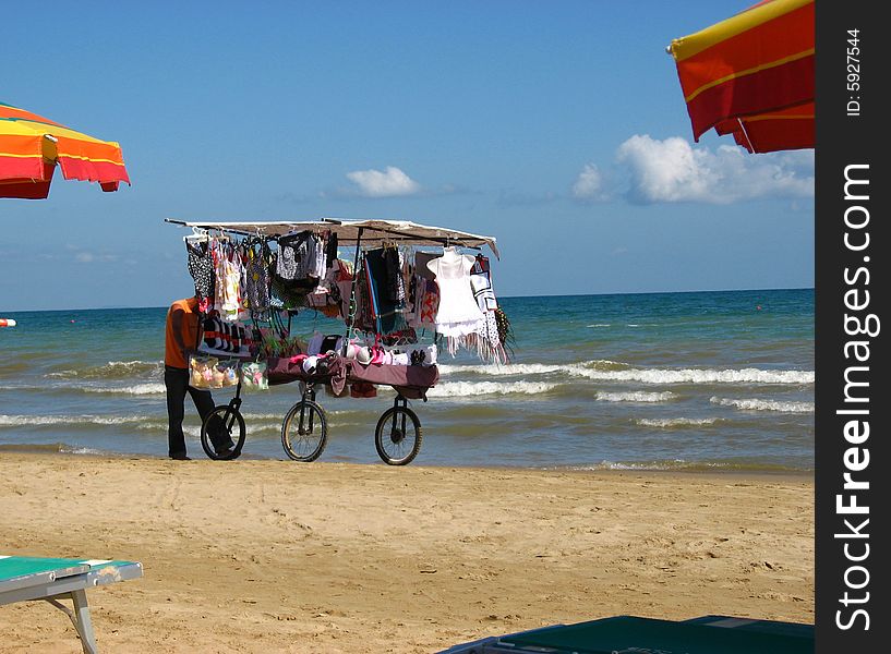 A vendor on the beach. A vendor on the beach