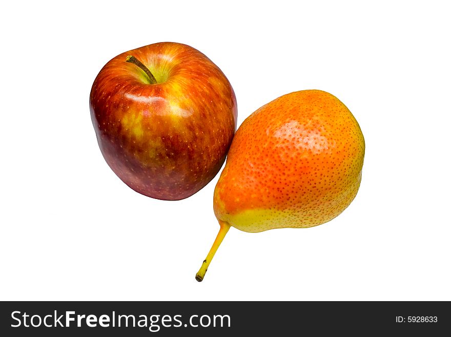 Juicy and sweet red apple and a pear on the white isolated background. Juicy and sweet red apple and a pear on the white isolated background