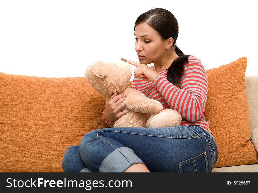 Happy brunette woman on sofa. Happy brunette woman on sofa