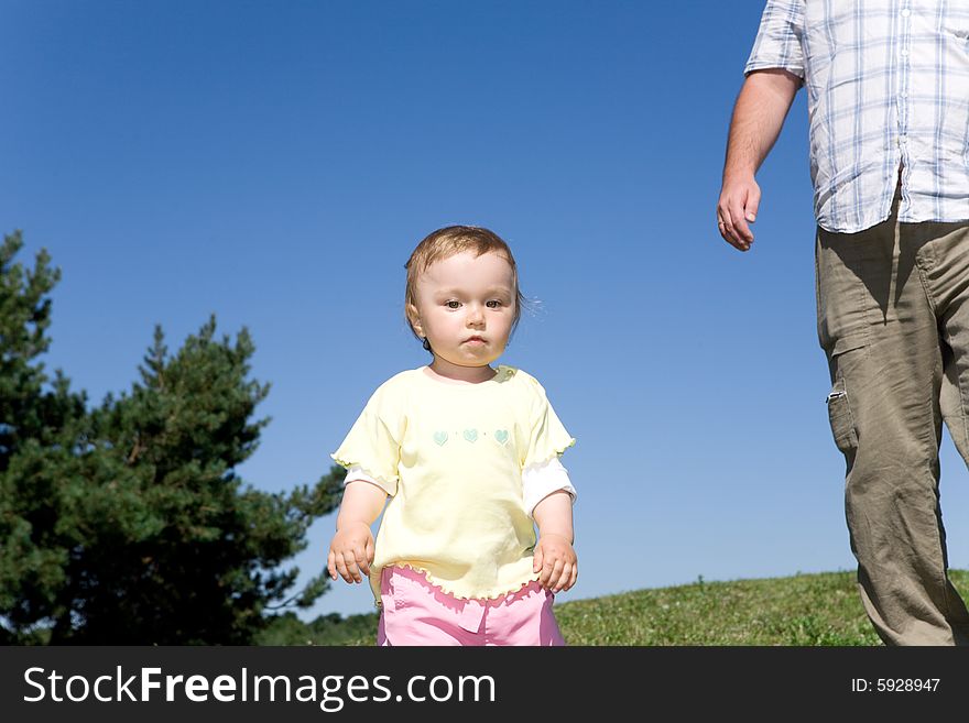 Happy family on green meadow. Happy family on green meadow