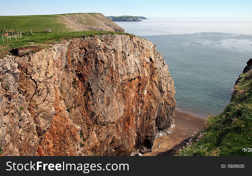 View of the rocky coast in summer. View of the rocky coast in summer