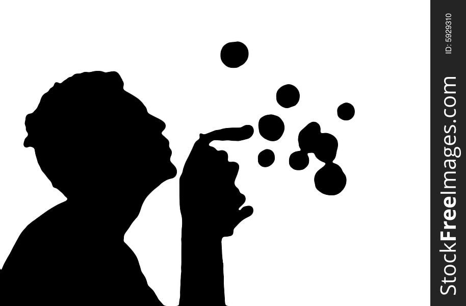 The silhouette of a teenager blowing bubbles