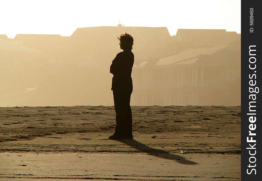 Silhouette of a woman on beach