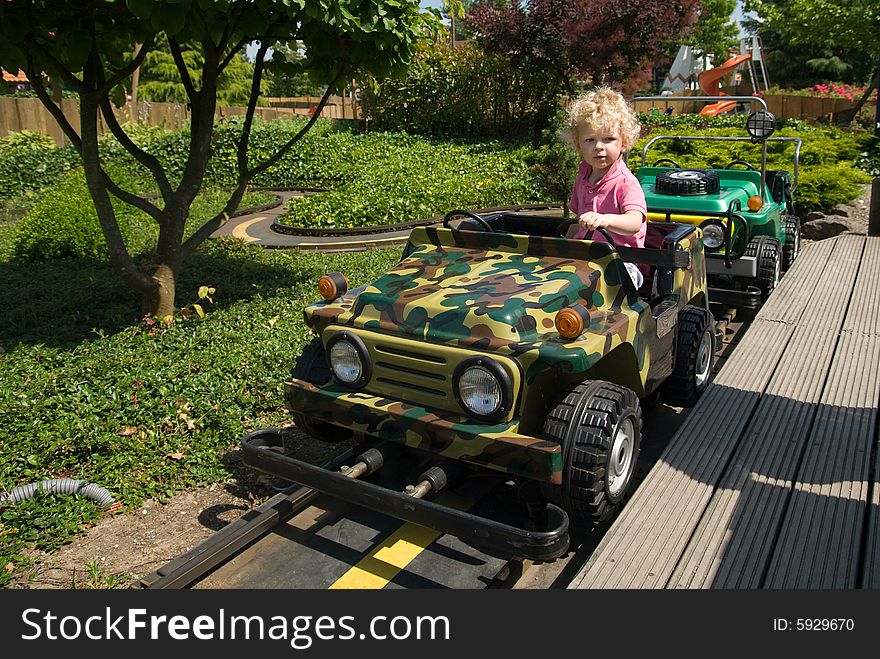 Cute young boy in a car