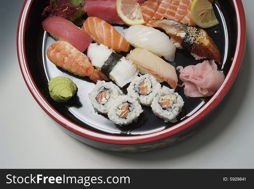 Sushi on round ceramic plate