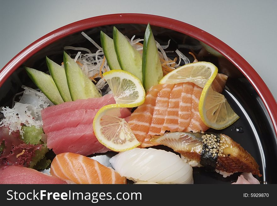 Sushi on round ceramic plate