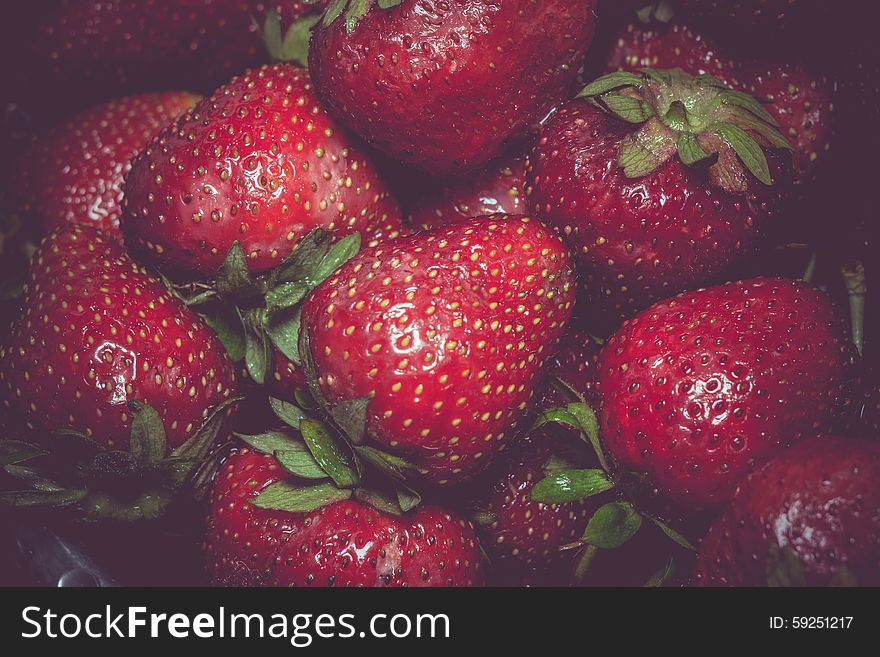 Fresh ripe strawberries background, vintage photo effect. Fresh ripe strawberries background, vintage photo effect.